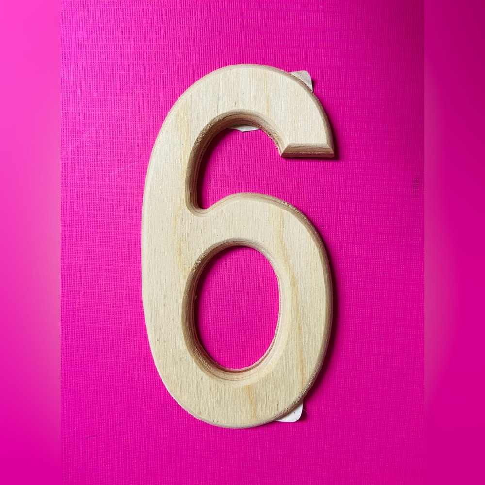 New. 3D wooden number 9 (nine) or 6 (six). Natural tan wood color.